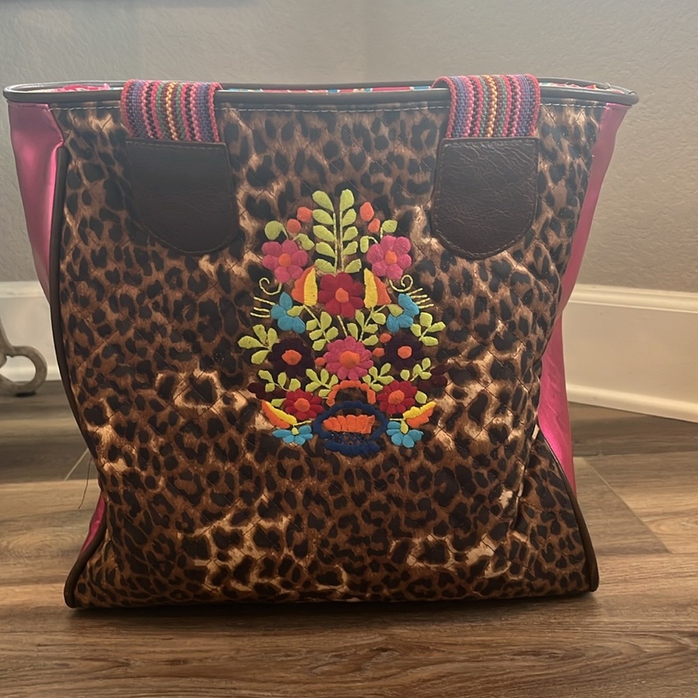 Well loved Consuela tote bag with animal print and hot pink